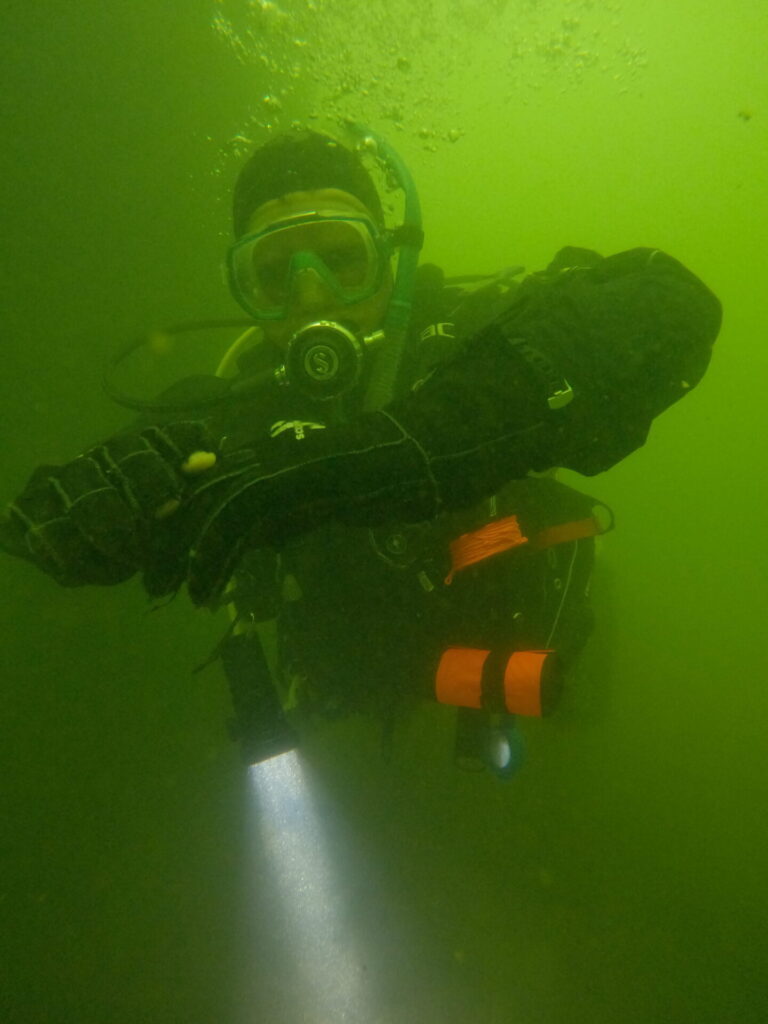 Diver hanging around with the Camaro Drysuit